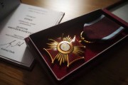 Na zdjęciu Złoty Krzyż Zasługi